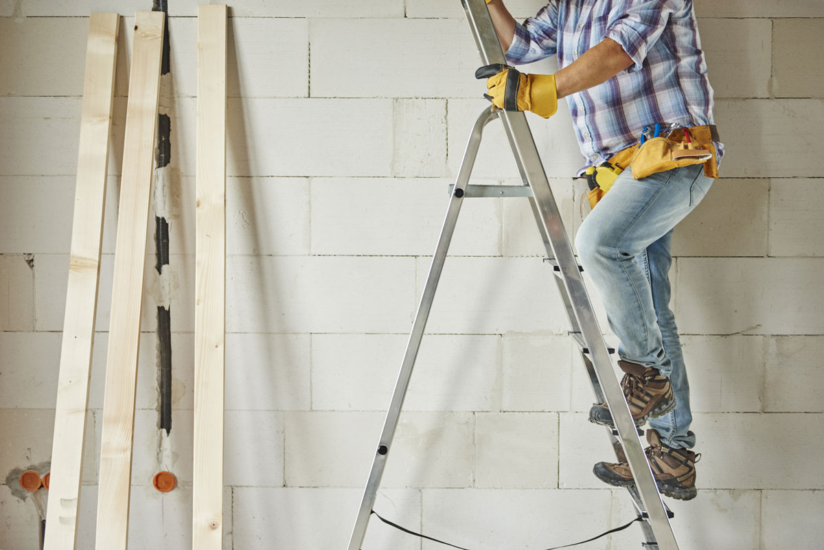 working at height man up ladder