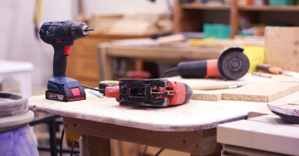 Power tools on construction table