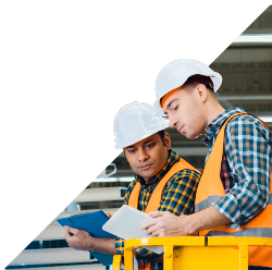 On-site project managers looking at data